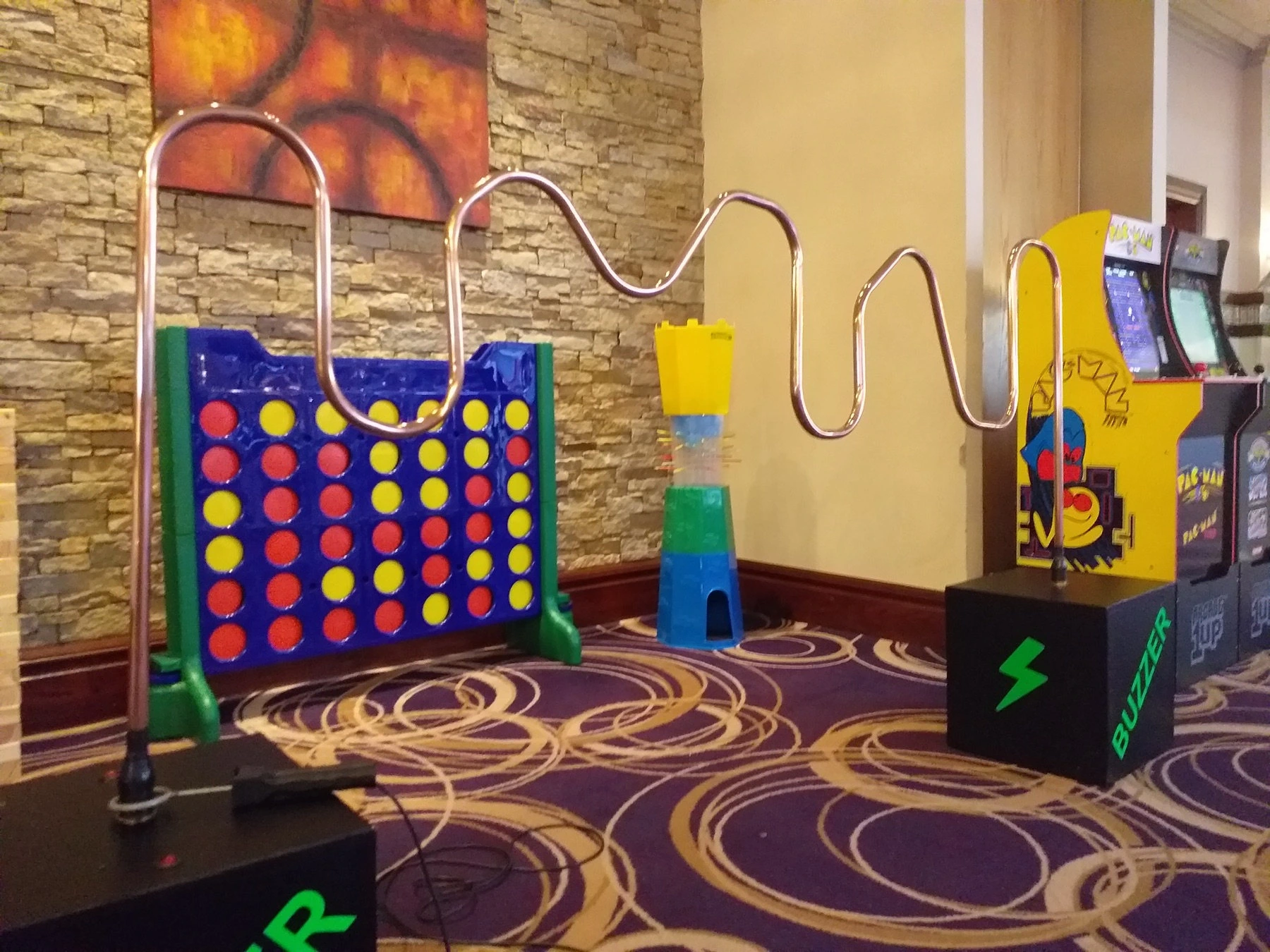 Crazy Vegas arcade and giant games set up together at a venue